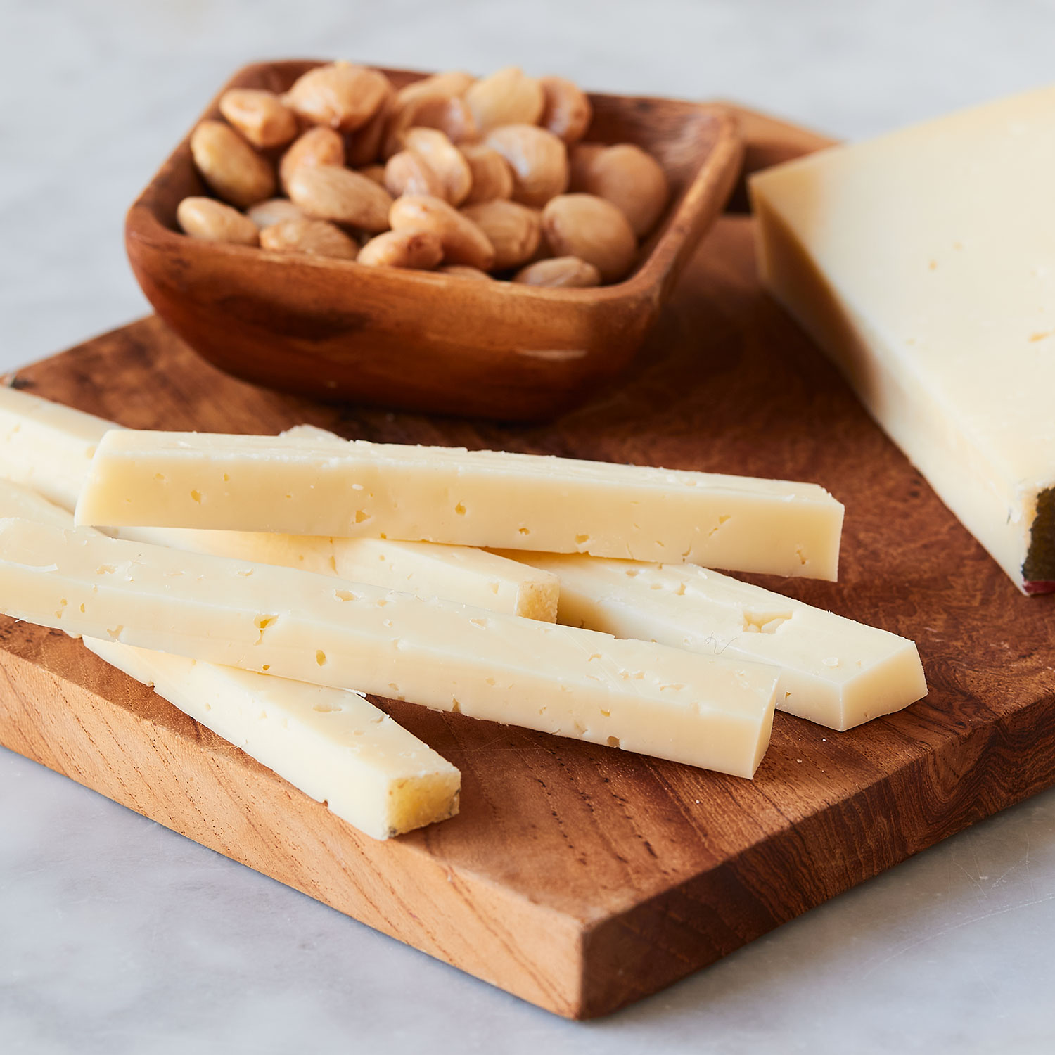 Asiago Pressato a mild, sweet, buttery Italian cow’s milk cheese