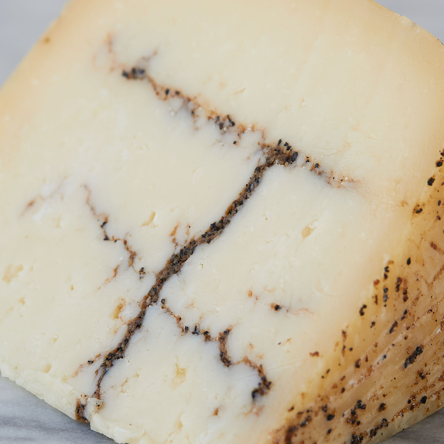 Moliterno Al Tartufo a rich, buttery truffle cheese Murray's Cheese